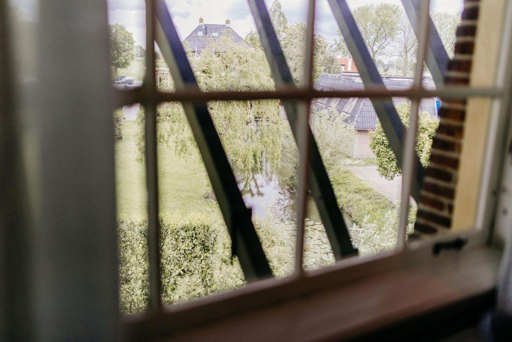 Отель Slapen In De Molen Arkel Экстерьер фото