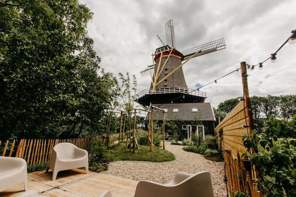 Отель Slapen In De Molen Arkel Экстерьер фото